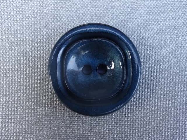knoop 28 mm  007.V85034.28    kleur 750